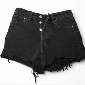 Black denim shorts with ripped details